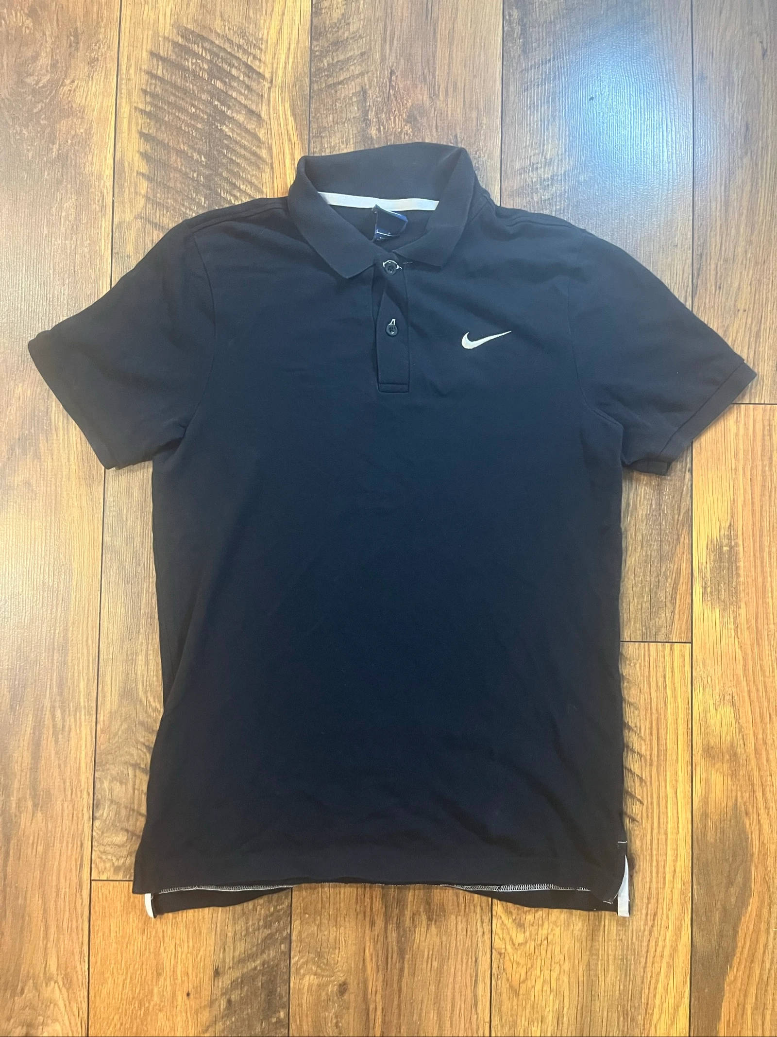 Polo noir logo brodé - Nike - taille S - très bon état